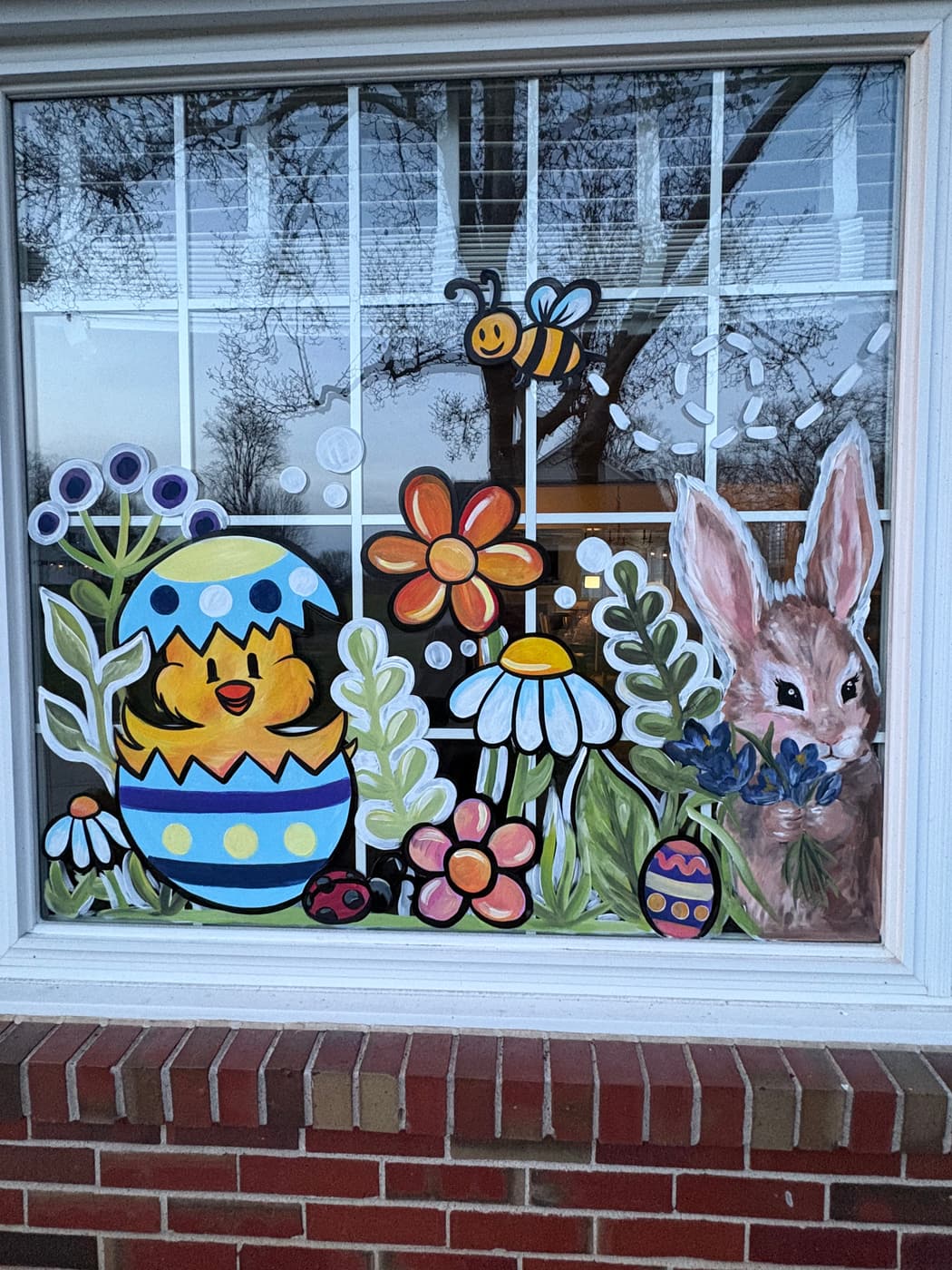 Easter window painting by Lucy